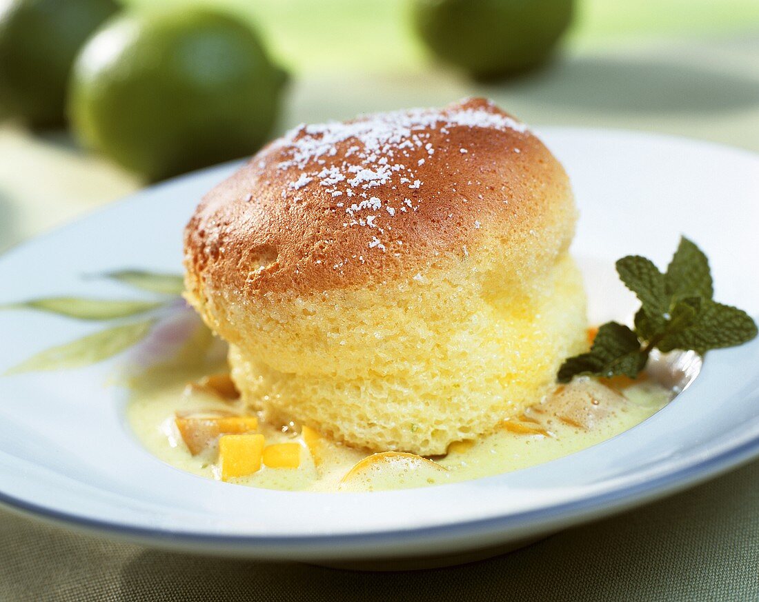 Lime soufflé on fruit ragout with woodruff whip
