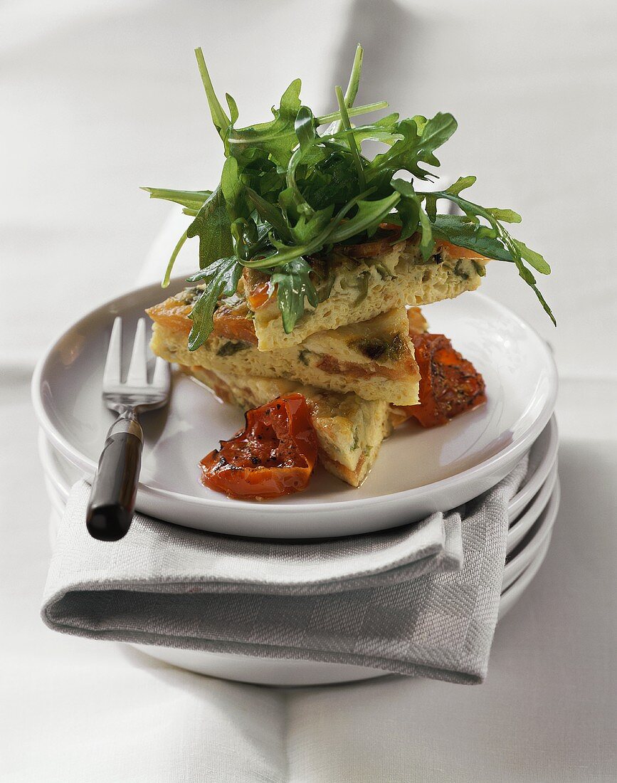 Frittata al pomodoro (omelette with tomatoes and rocket, Italy)