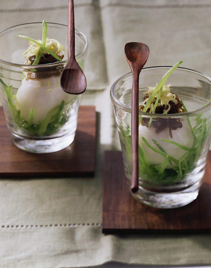 Eggs in glasses with ginger and strips of mangetout