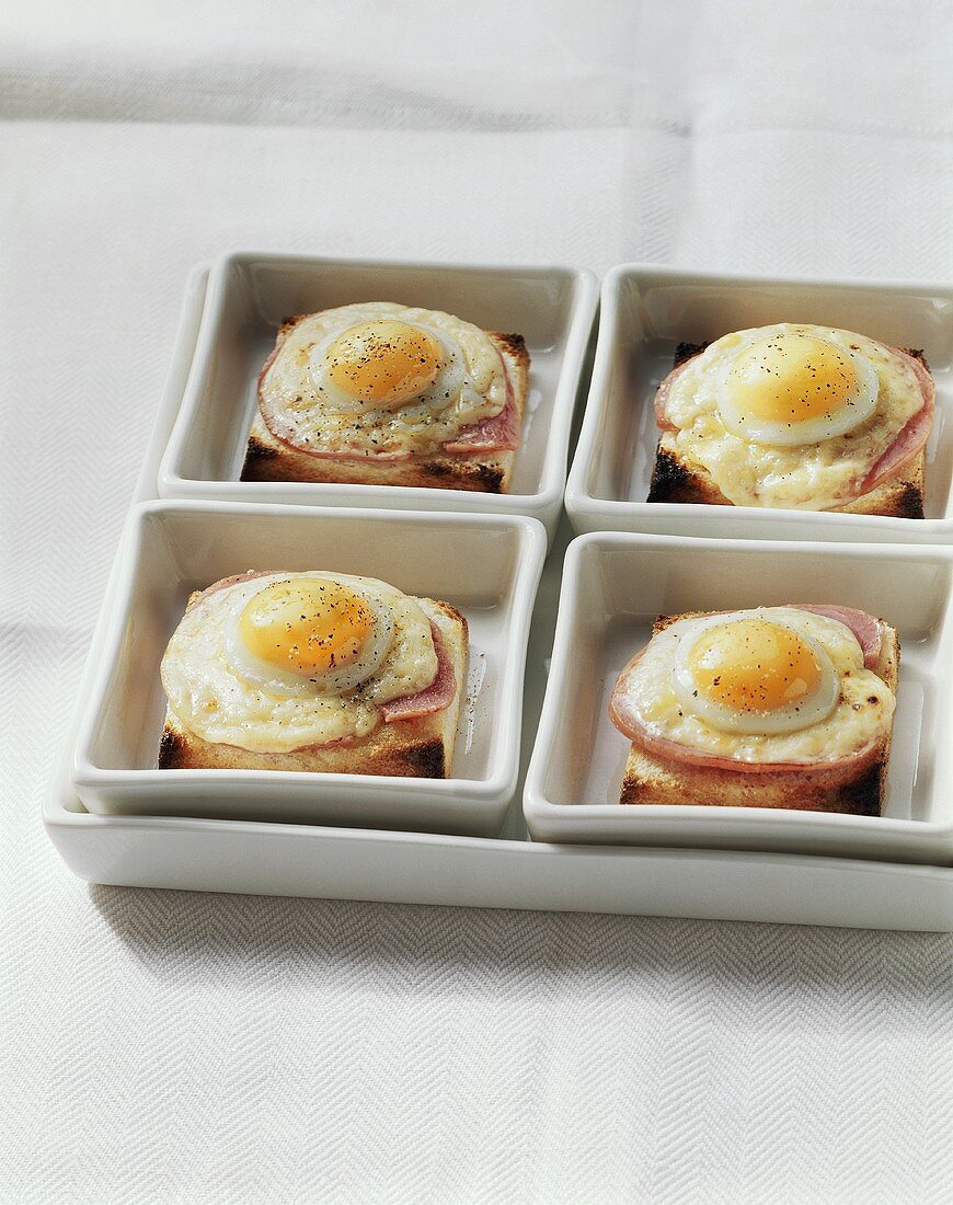 Ham and cheese on toast with quail's egg