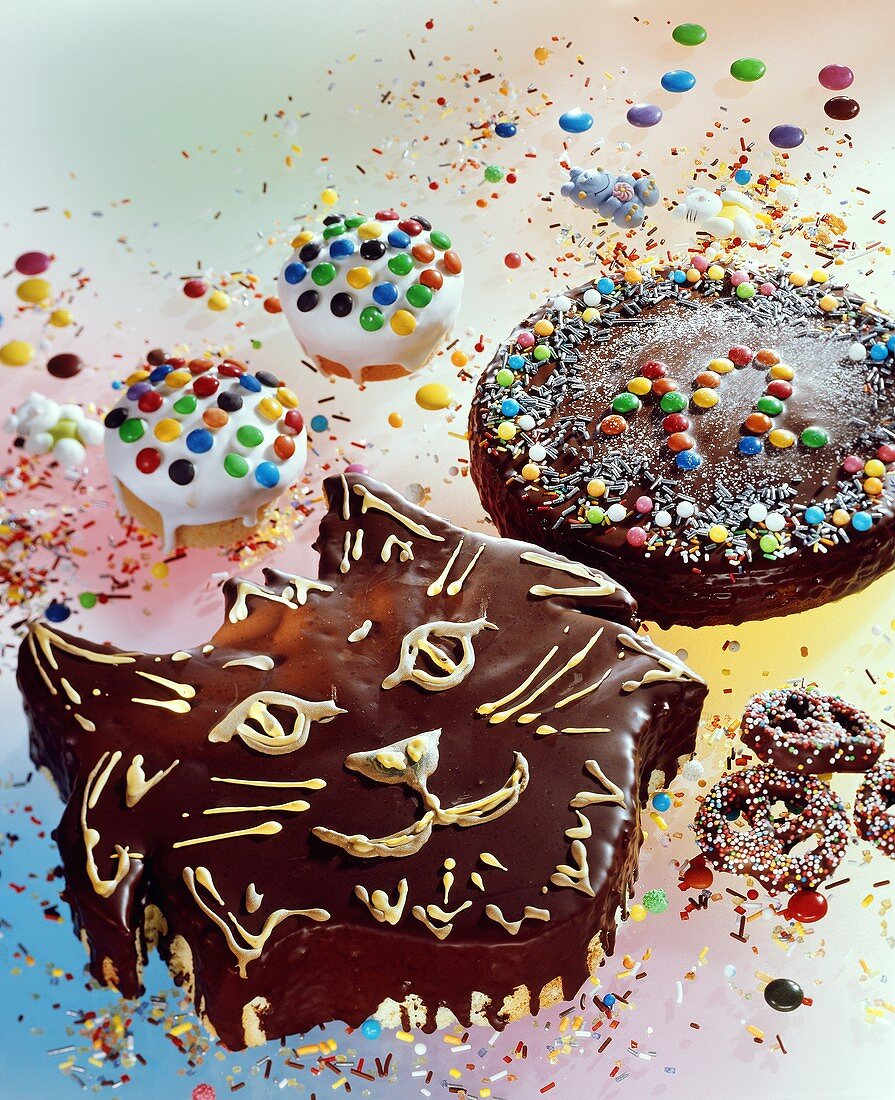 Cat cakes, muffins & chocolate cake for child's birthday