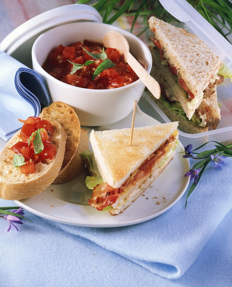 Club sandwich with chicken and ciabatta with tomato salsa