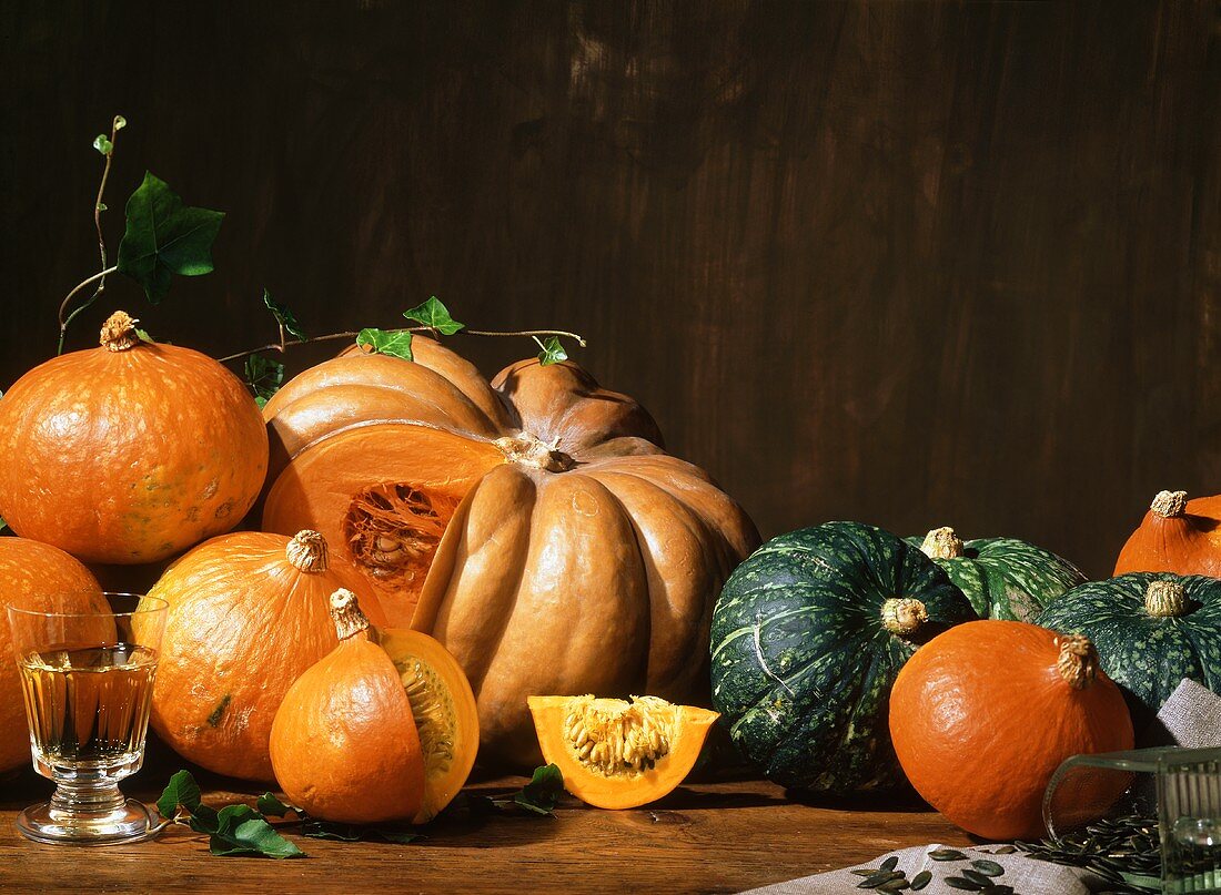 Autumnal pumpkin still life; white wine; pumpkin seeds