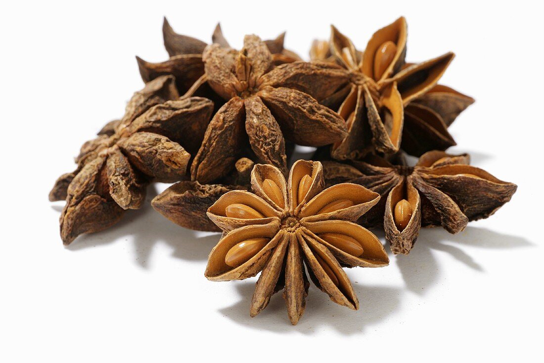 Several star anise on white background