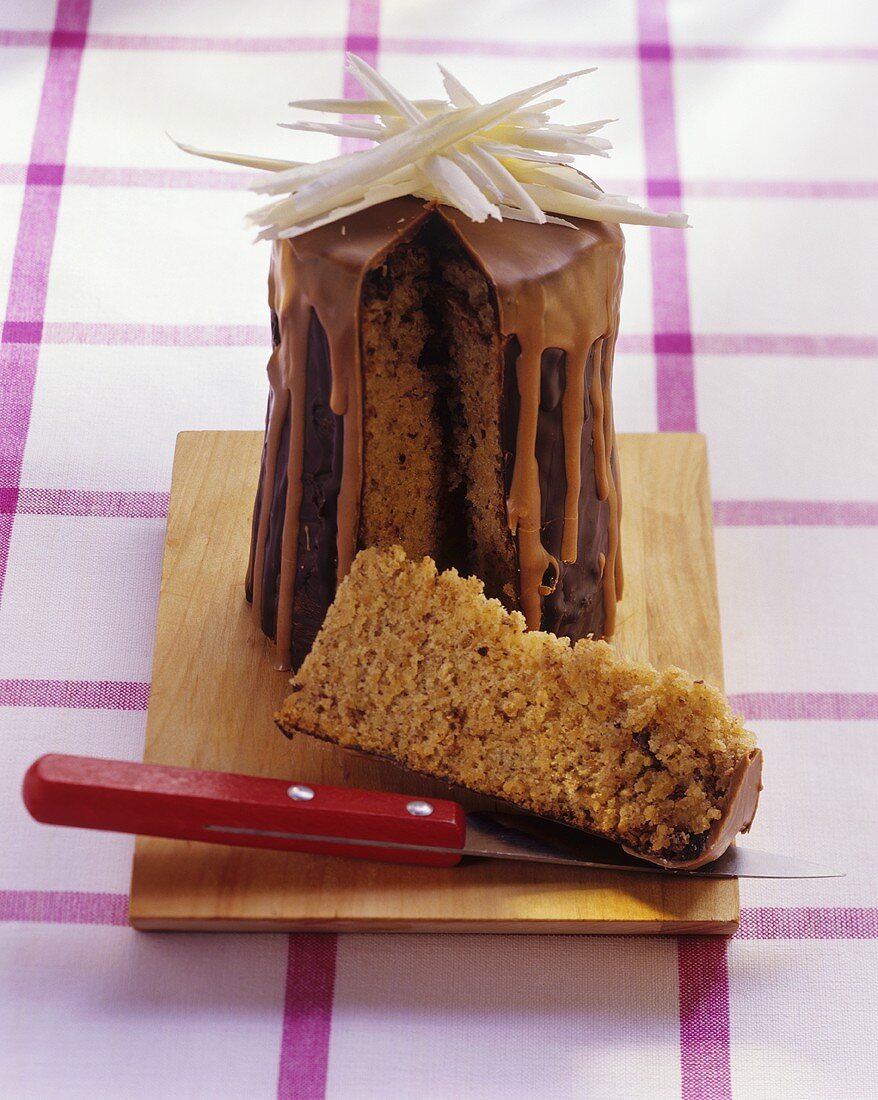 Hazelnut cake with chocolate icing, baked in a jar