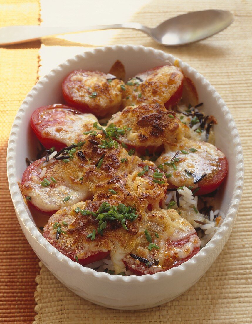 Rice and tomato gratin in baking dish