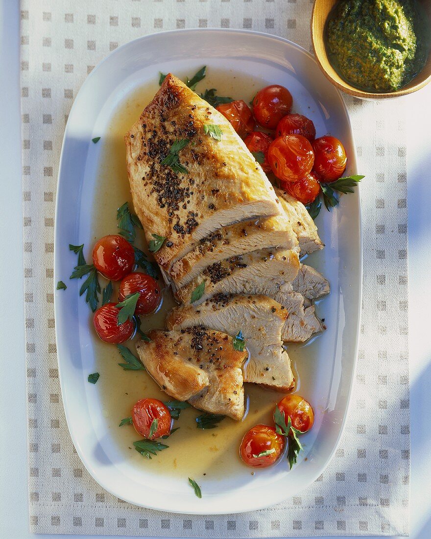 Turkey fillet with cherry tomatoes, with parsley sauce