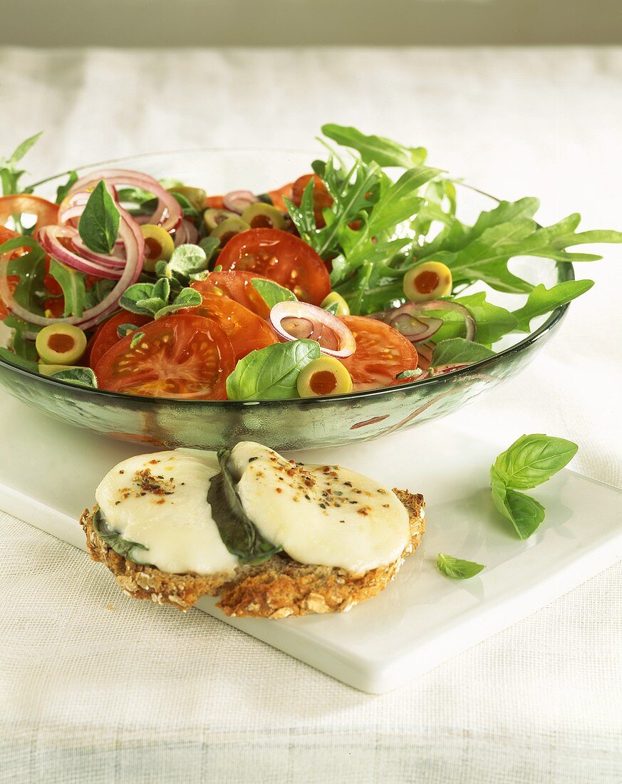 Tomato and rocket salad, with mozzarella bruschetta