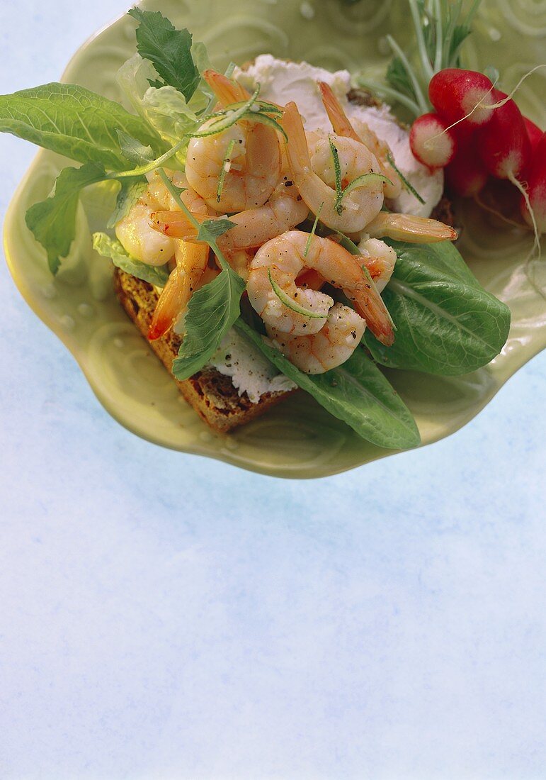 Wholemeal bread with soft cheese, shrimps & lettuce leaves