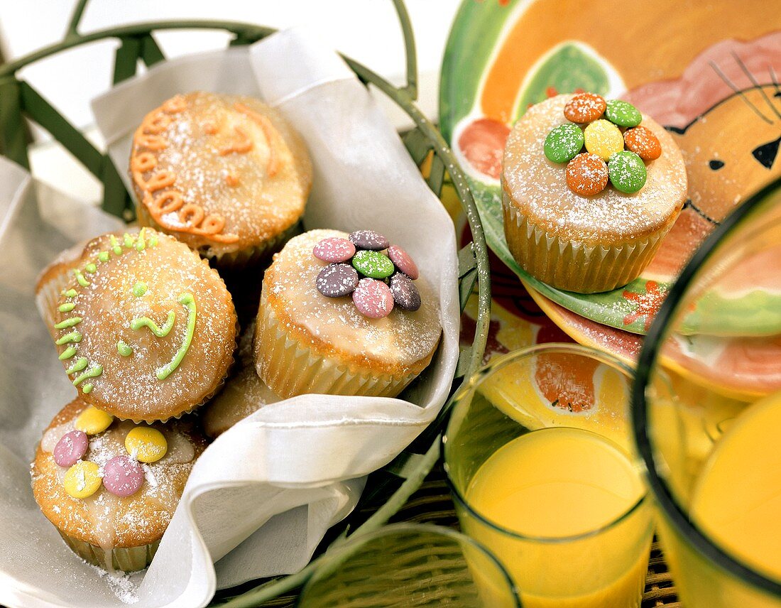 Lemon muffins with coloured chocolate buttons