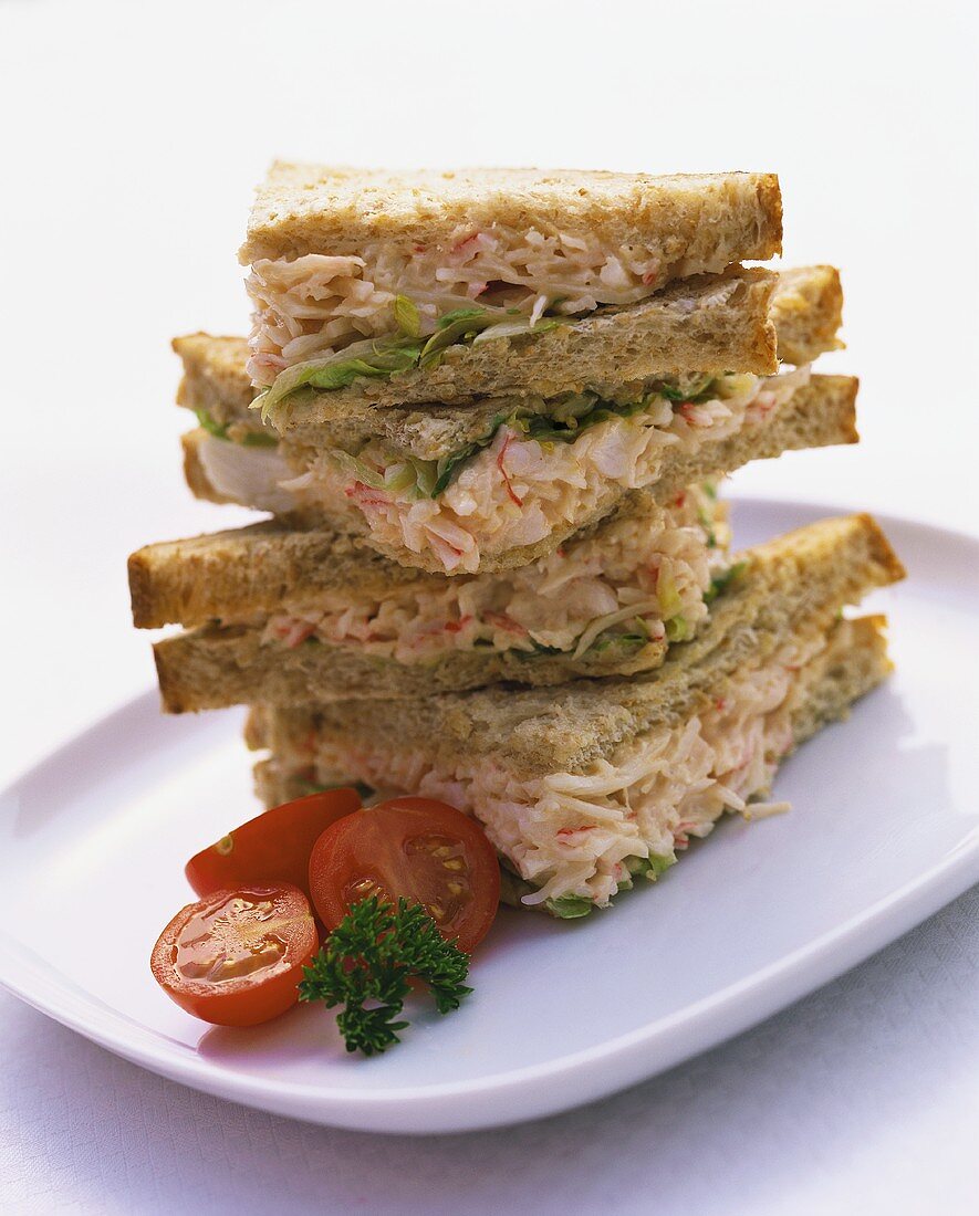 Sandwich tower with radish and cheese filling