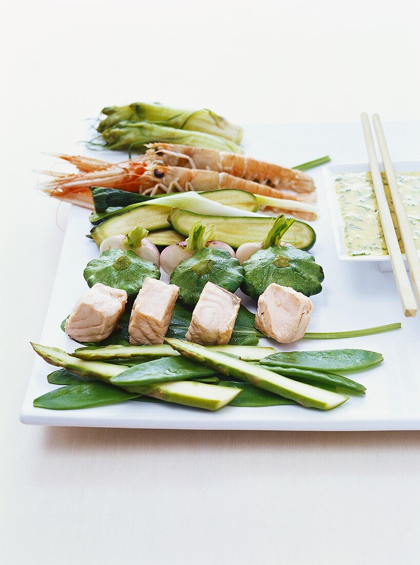 Ingredients for tempura (vegetables, fish, scampi, batter)