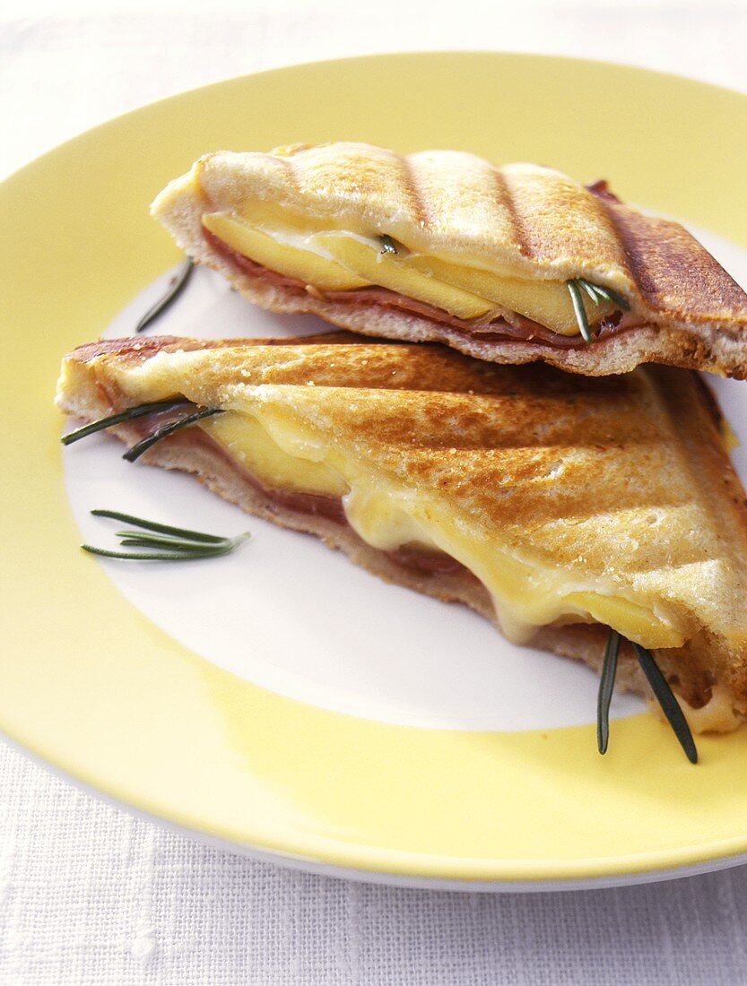 Toast triangles with ham and cheese filling