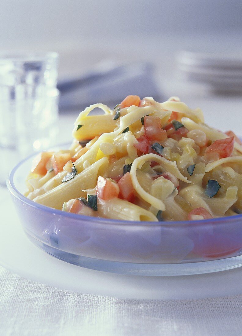 Pasta salad with diced tomatoes and cheese