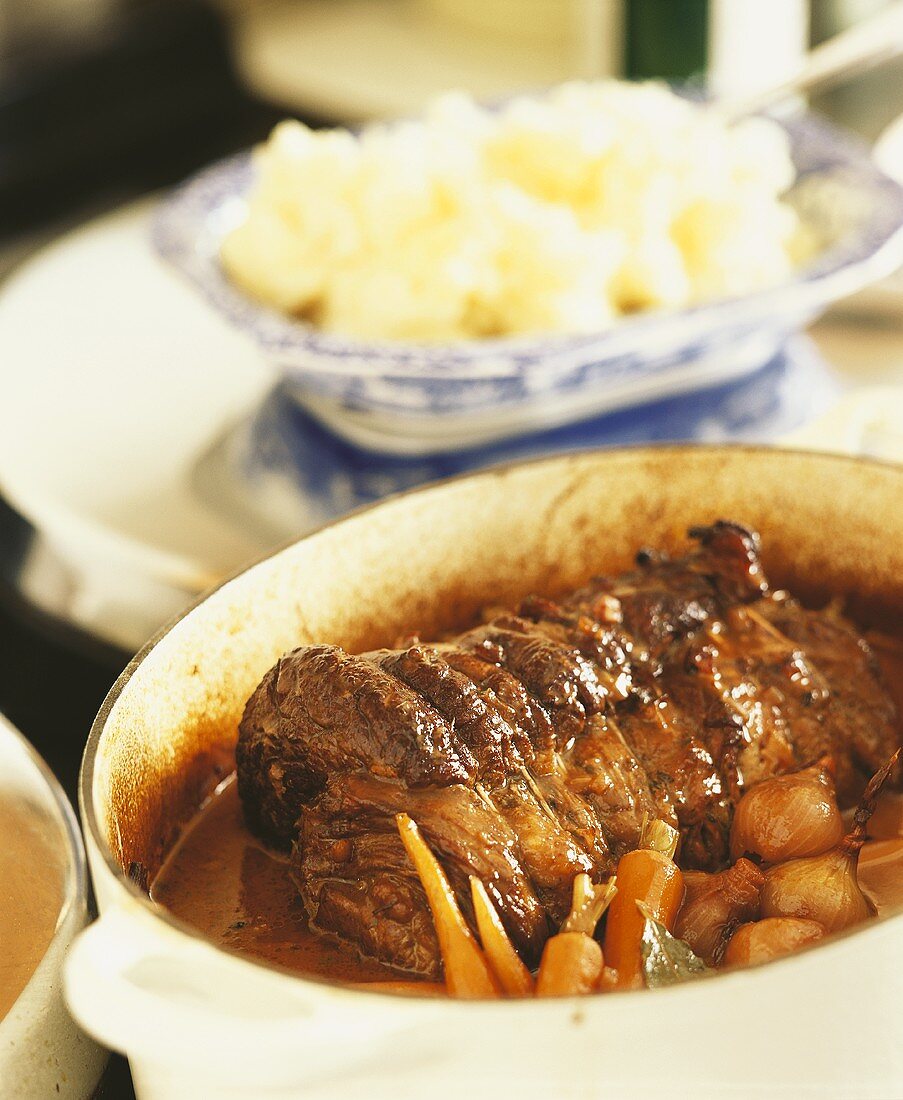 Roast lamb roll with vegetables and mashed potato