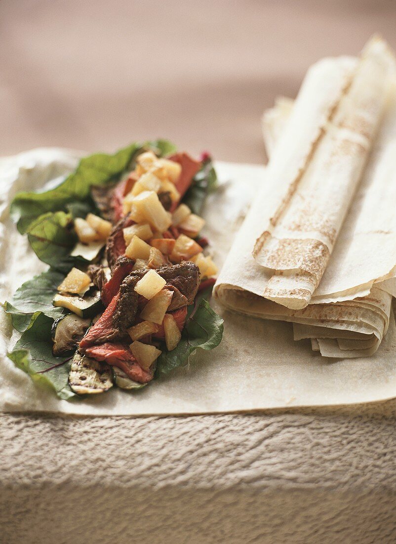 Roast beef and vegetables on flatbread