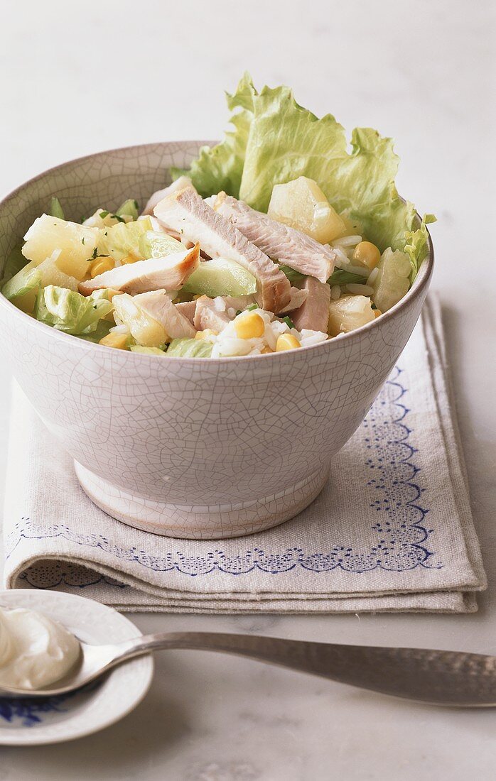Rice salad with turkey, celery and pineapple