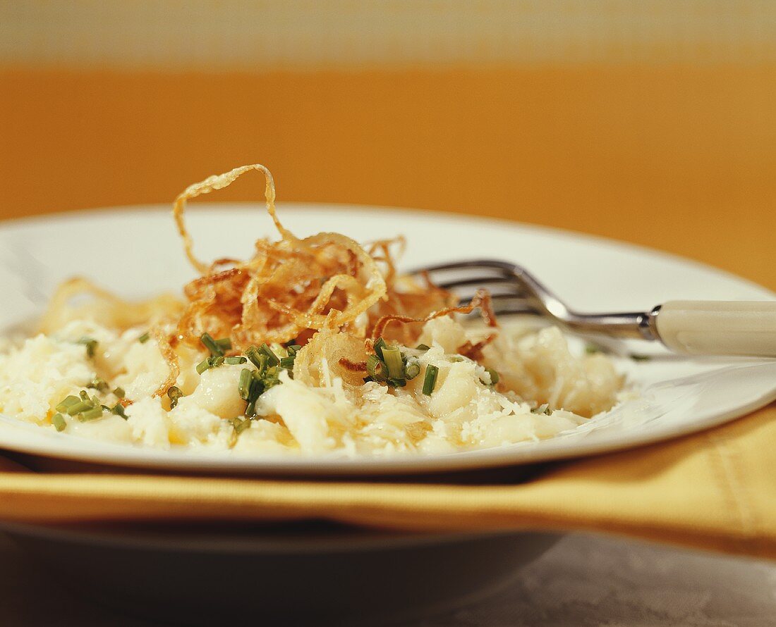 Cheese spaetzle noodles with deep-fried onions