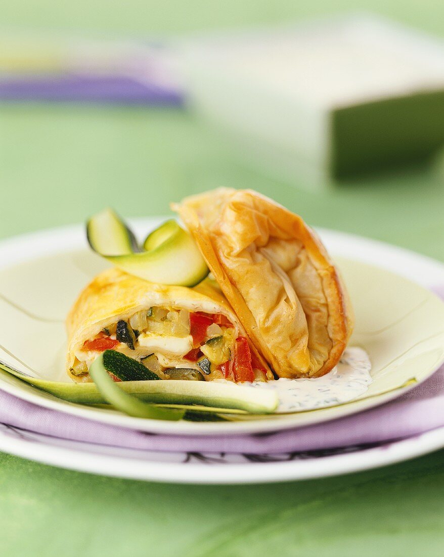 Vegetable strudel in yoghurt sauce