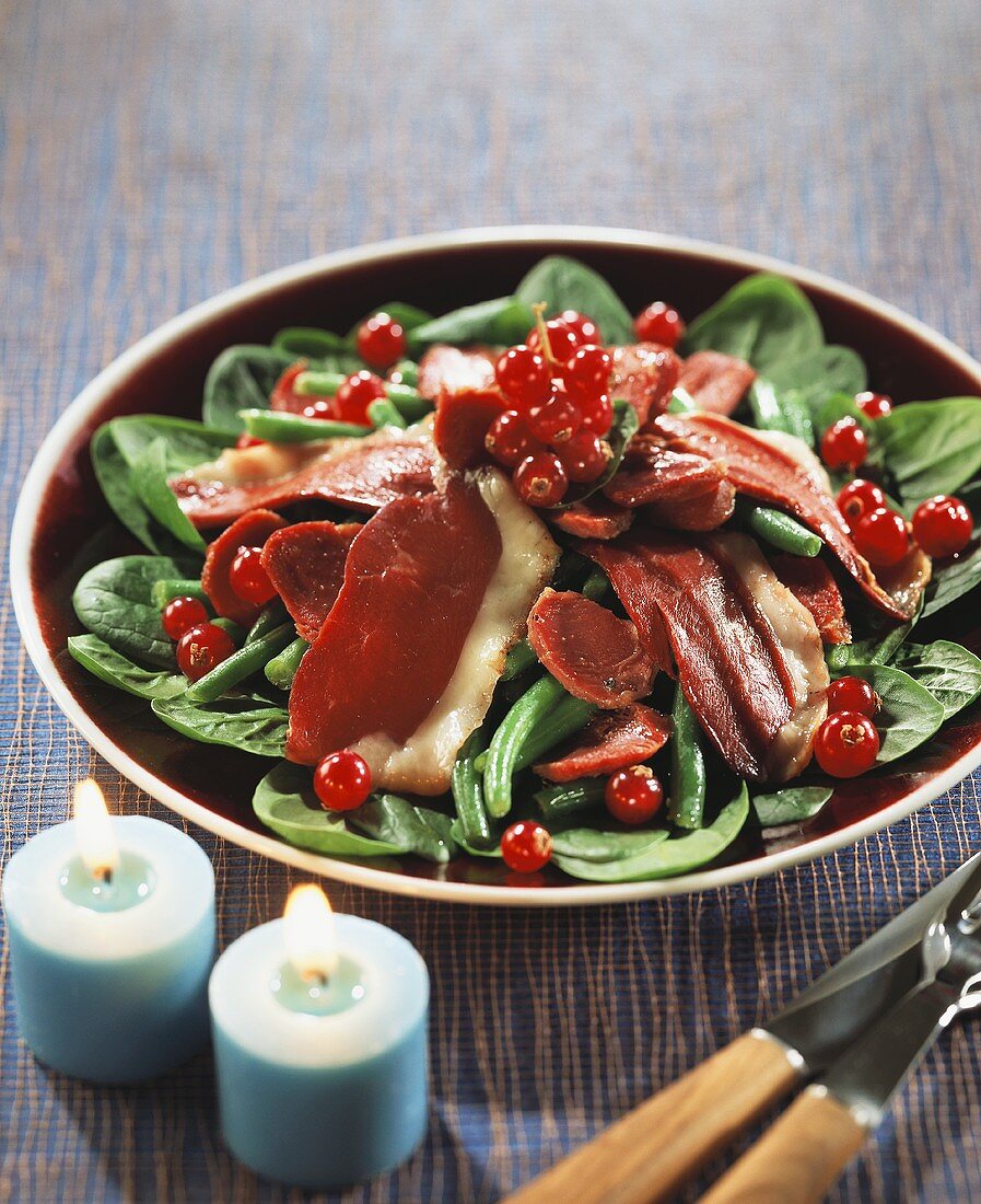 Green bean salad with duck breast and redcurrants