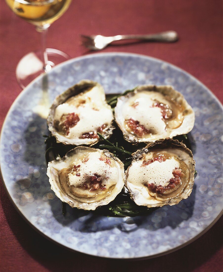 Oysters with onion confit and Muscadet butter sauce