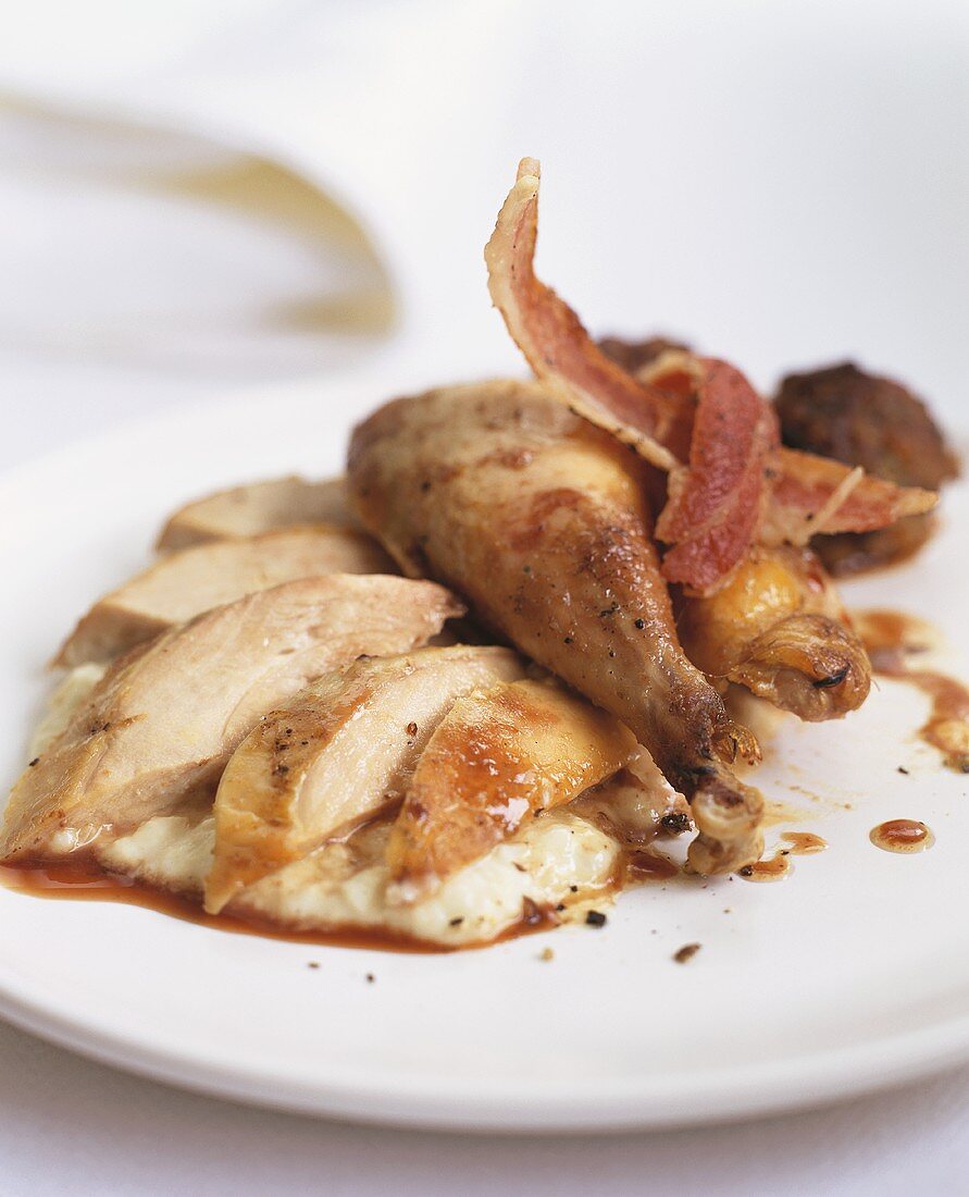 Roast pheasant with bacon and mashed potato