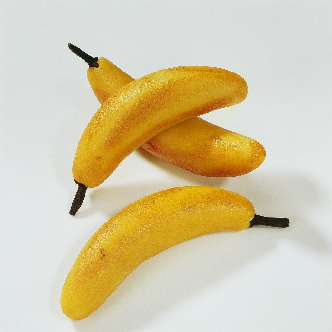 Three marzipan bananas