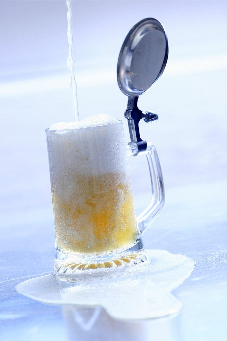 Pouring beer into a tankard