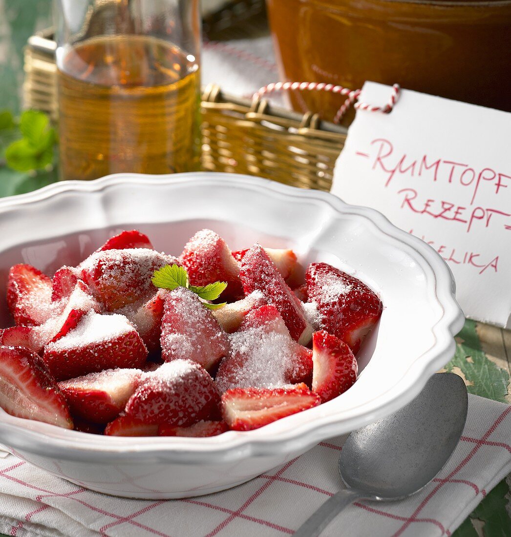 Sugared strawberries for Rumtopf (fruit and sugar in rum)