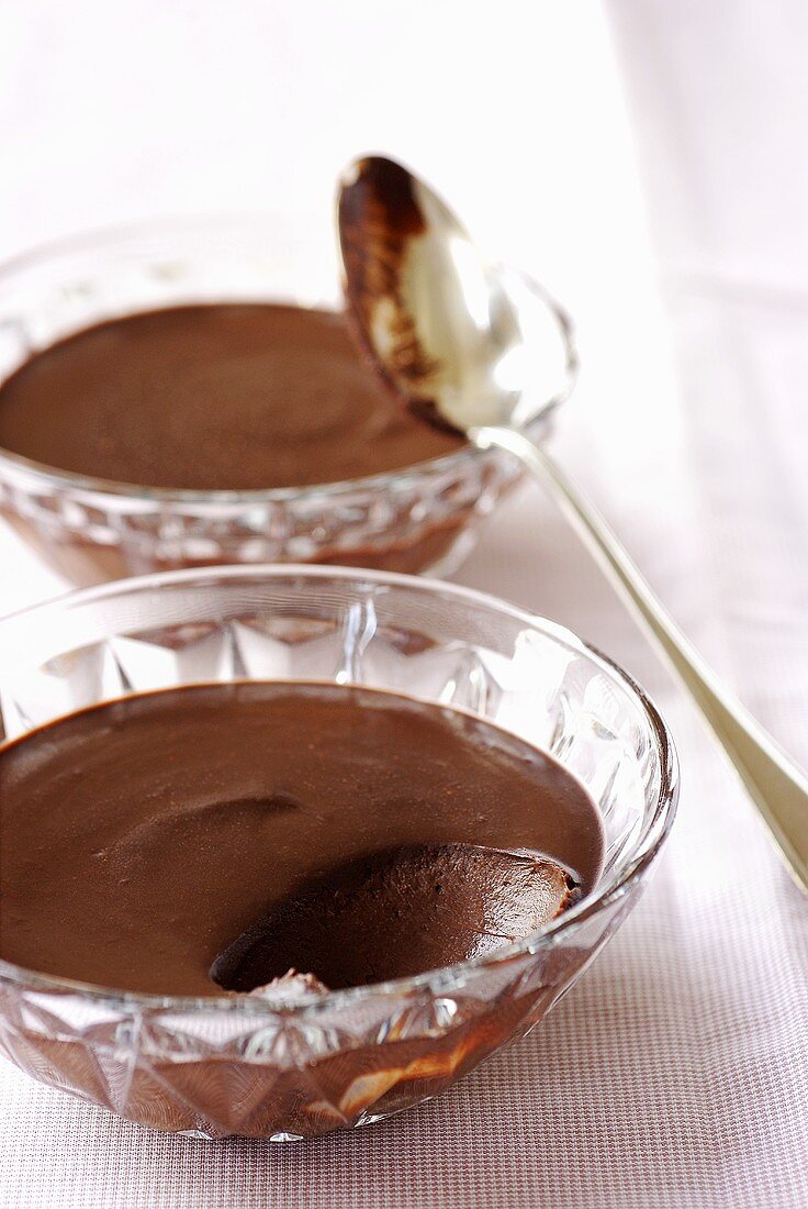 Chocolate cream in two glass bowls