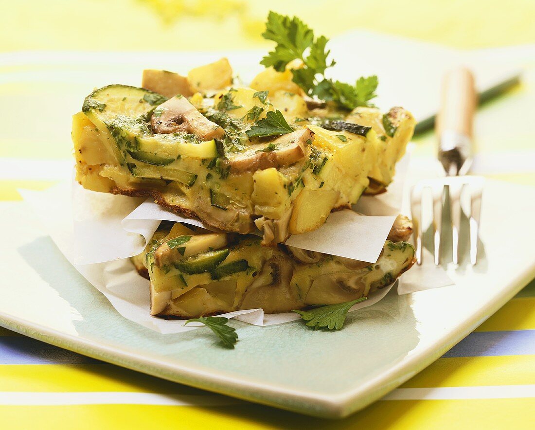 Potato frittata with mushrooms and courgettes 