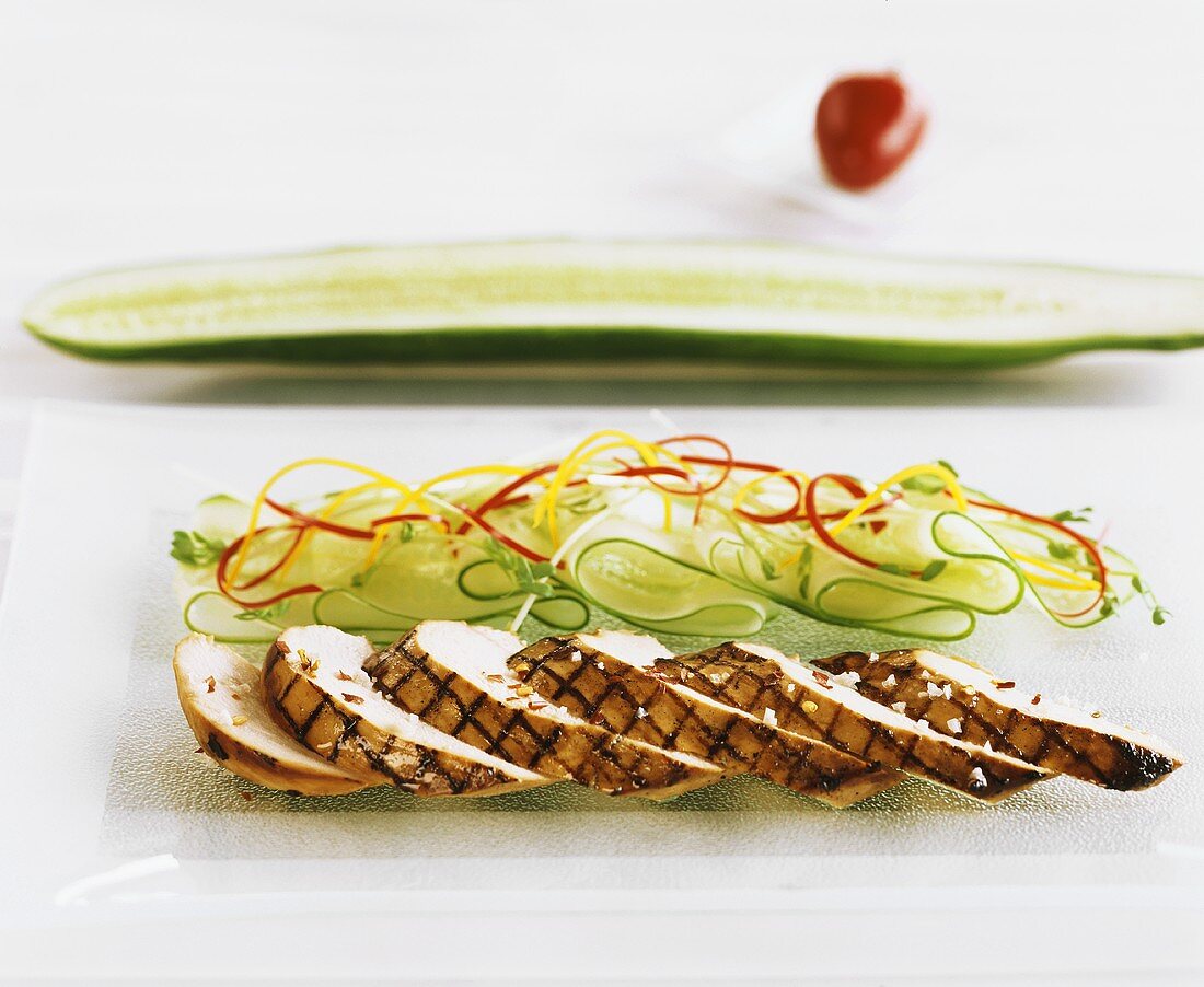 Grilled chicken breast with cucumber salad