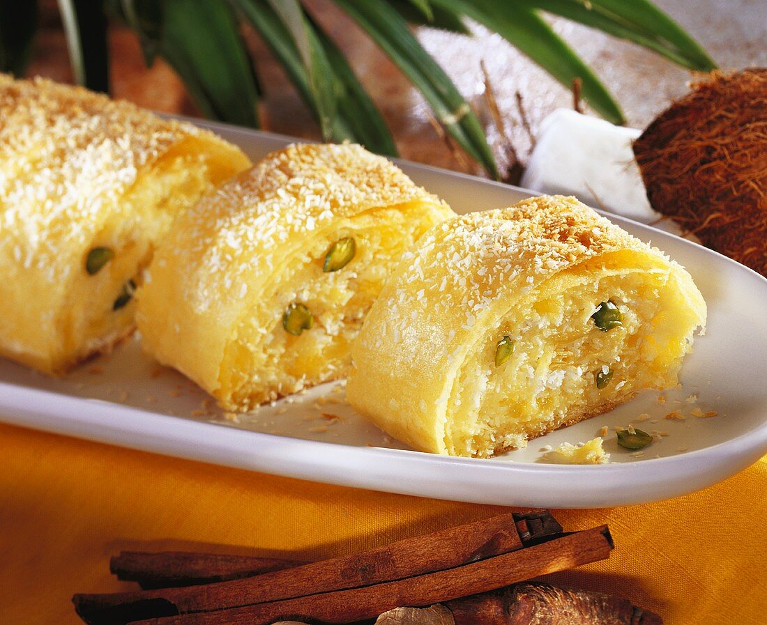 Pineapple strudel with coconut and pistachios