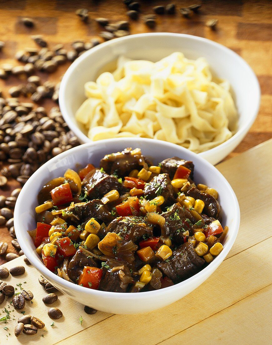 Beef goulash with sweetcorn and peppers, coffee noodles