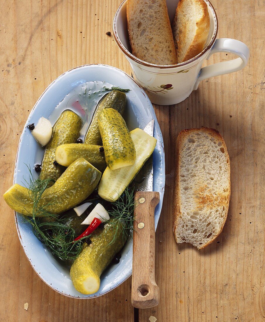 Pickled cucumbers with slices of white bread