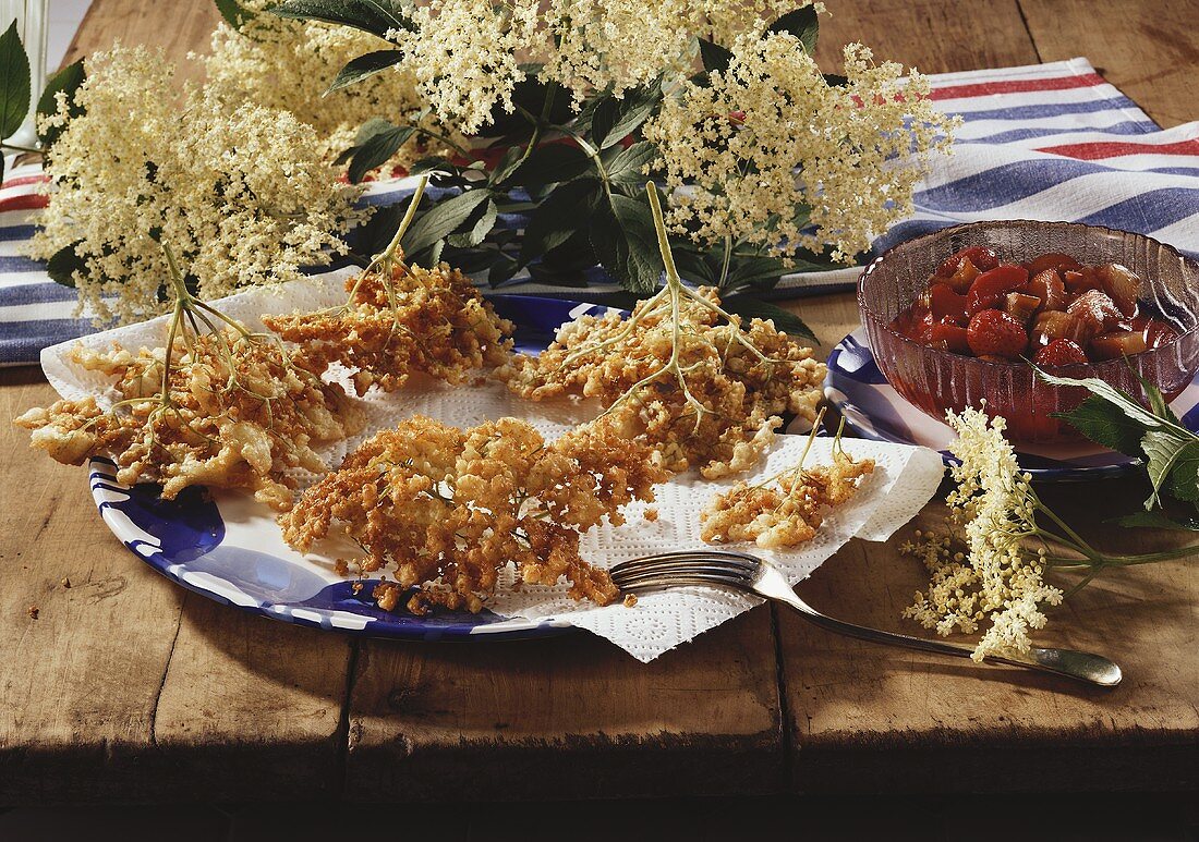 Elderflower fritters and strawberry and rhubarb compote