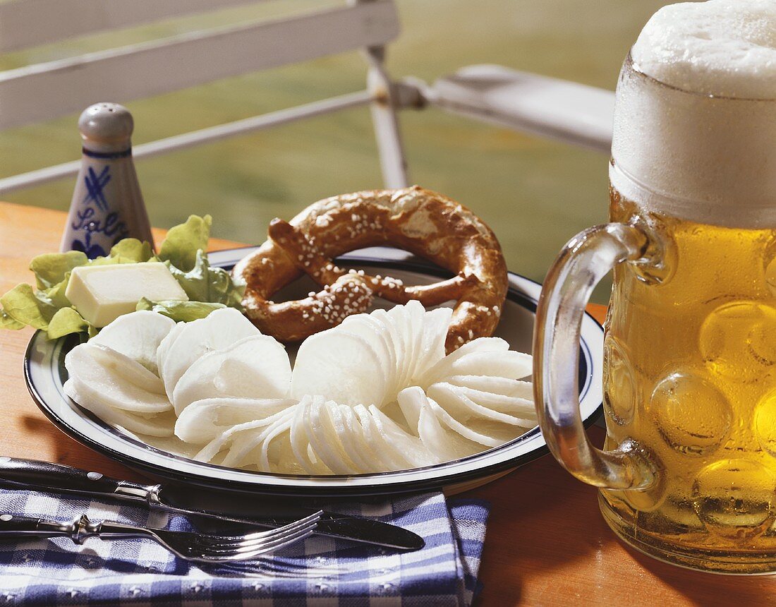 Bavarian 'Brotzeit' with radish, pretzels and beer