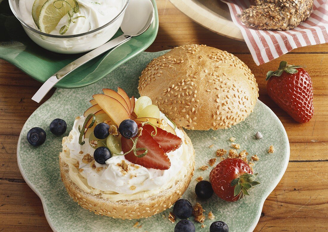 Sesame roll with lime quark and fresh fruit