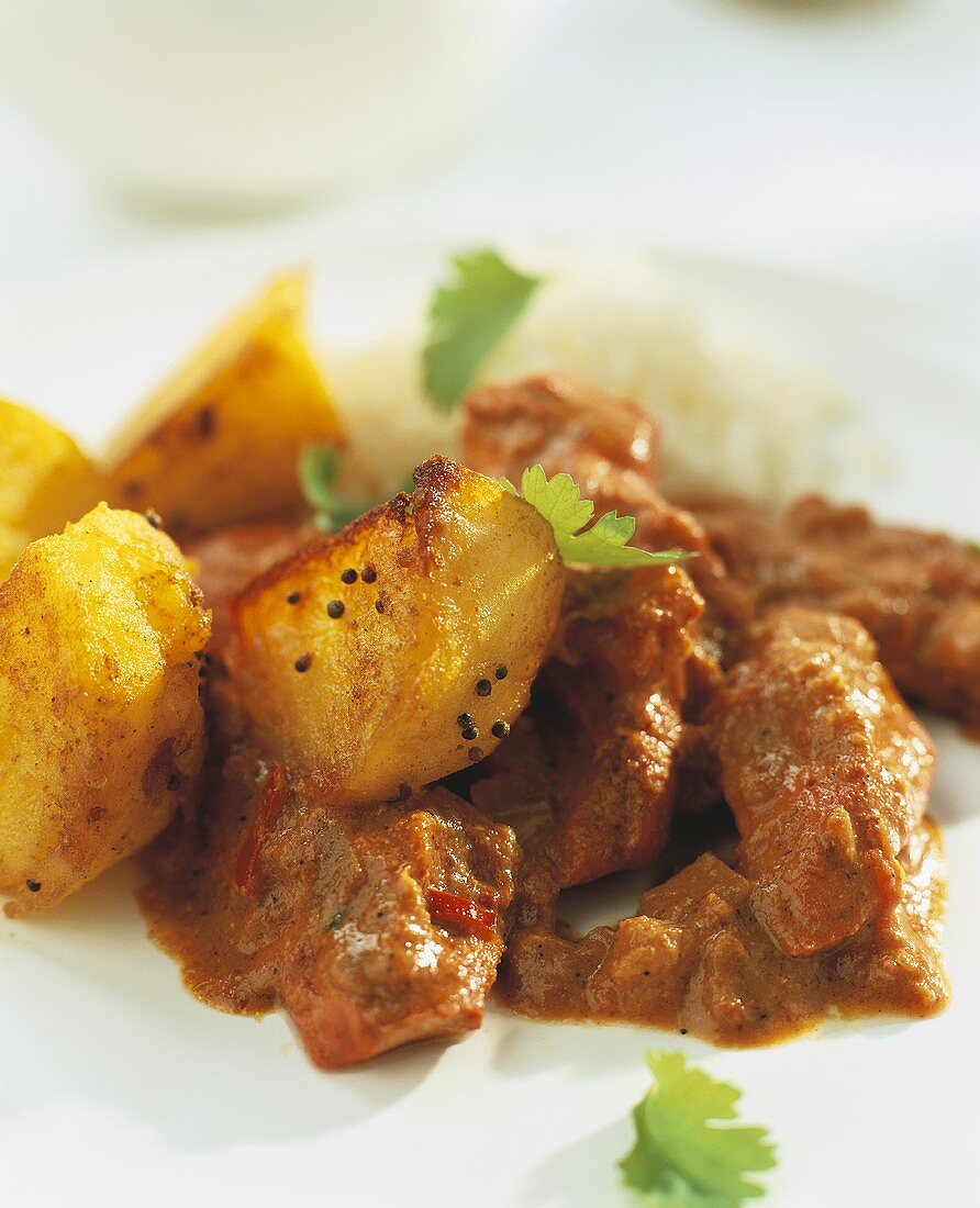 Lamb stew with potatoes and coriander leaves (India)