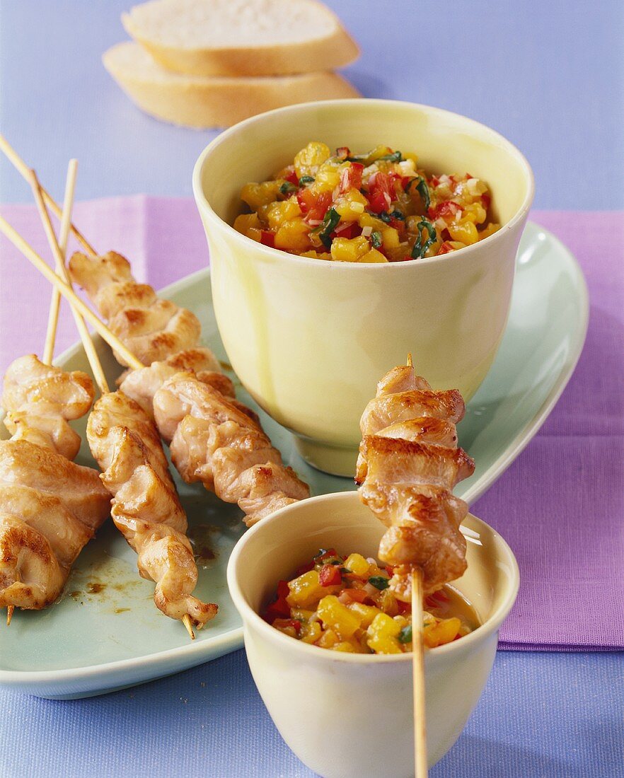 Marinated chicken kebabs with nectarine dip and white bread