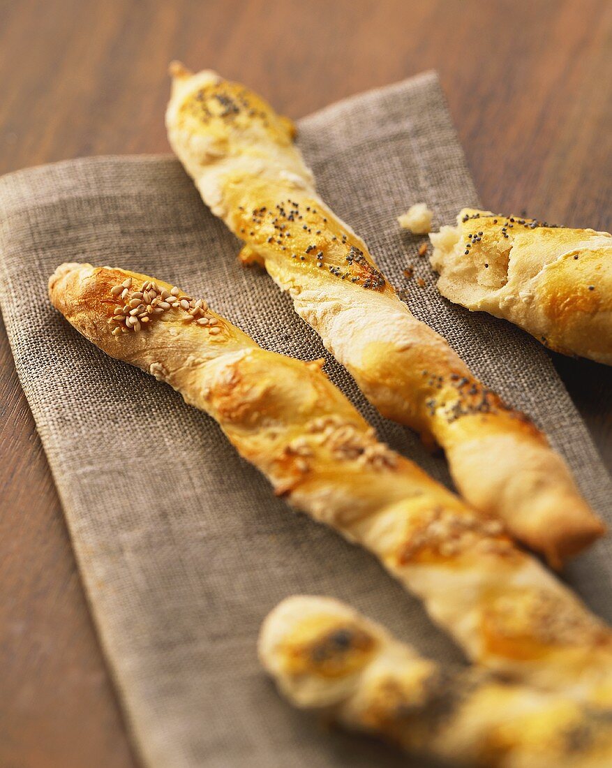 Savoury bread sticks with poppy seeds, sesame and Parmesan