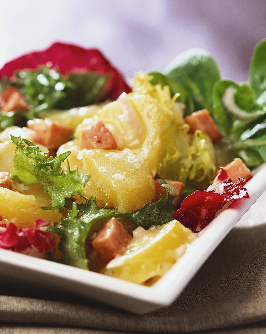 Potato salad with beer dressing and meatloaf (Leberkäse)