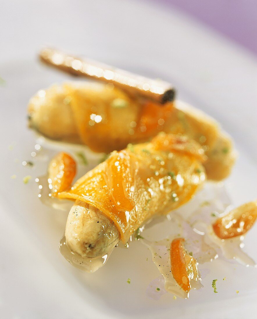 Turmeric crepes with bananas, kumquats and honey sauce