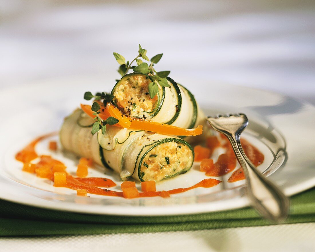 Courgette roulades with pepper sauce