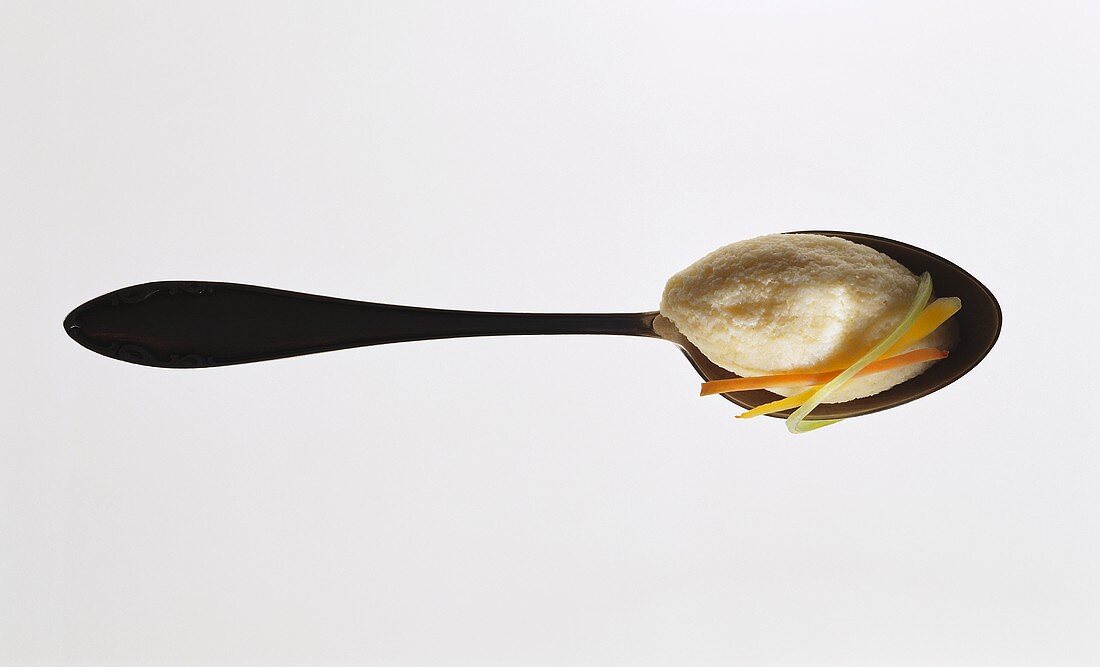 Semolina dumpling on spoon
