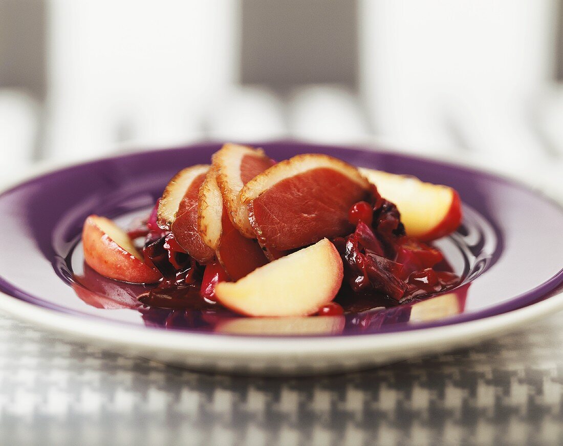 Smoked goose breast with red cabbage and apples