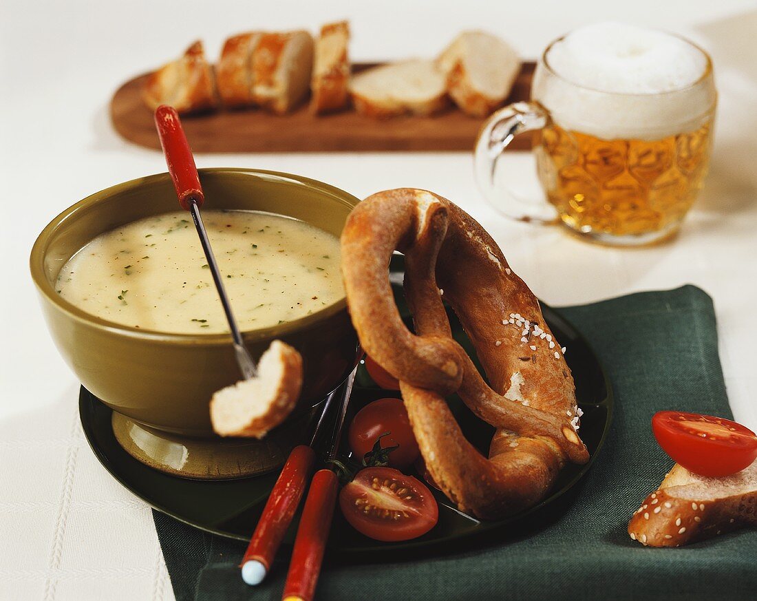 Beer fondue with pretzel
