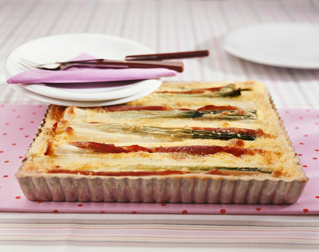 Asparagus and spring onion tart in baking dish