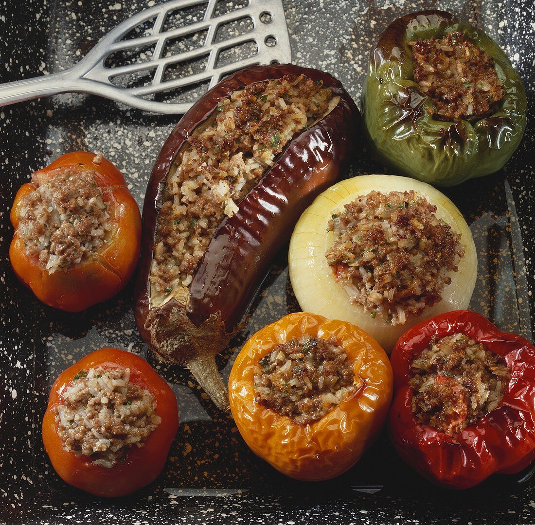 Stuffed vegetables on baking tray