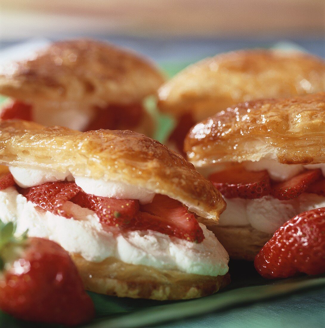 Puff pastries filled with strawberries and cream